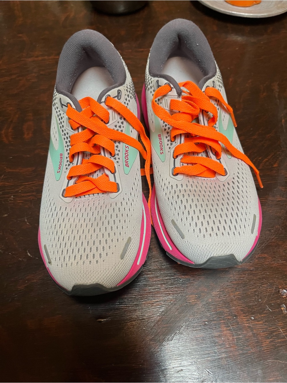 Brooks Women’s Running Shoes in Light Gray with Orange & Pink Trim